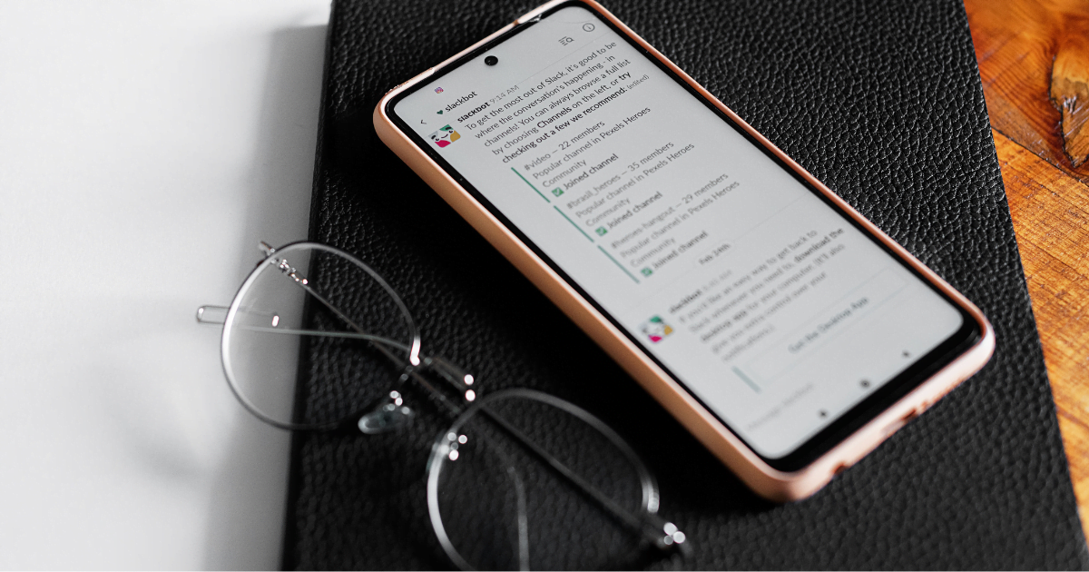Photo of a mobile phone using the Slack chat app